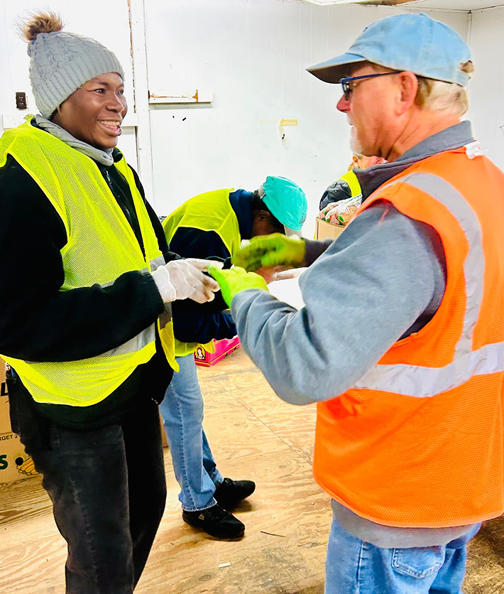 workers smiling, talking