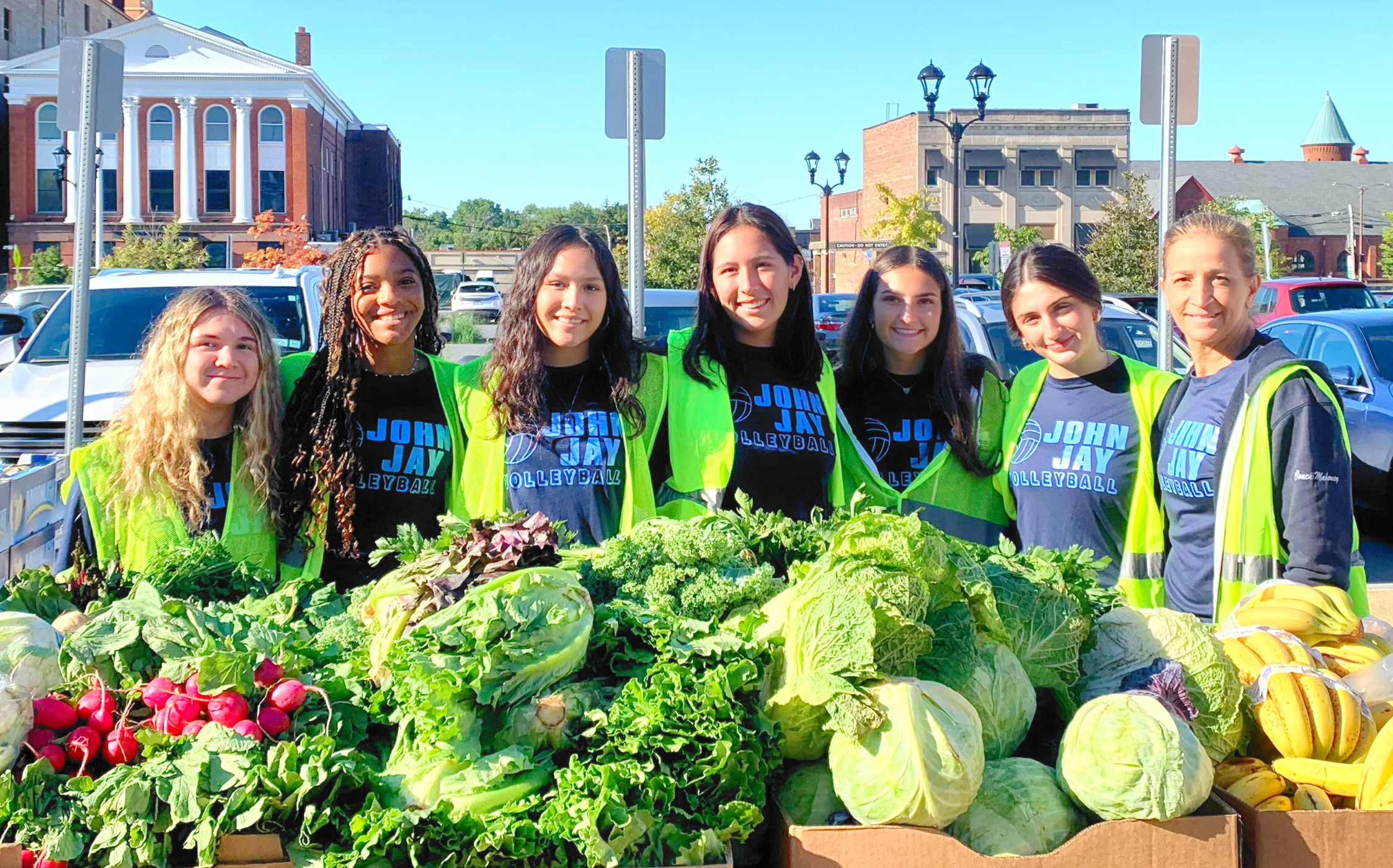 John Jay Volleyball volunteers at a Farm Stand