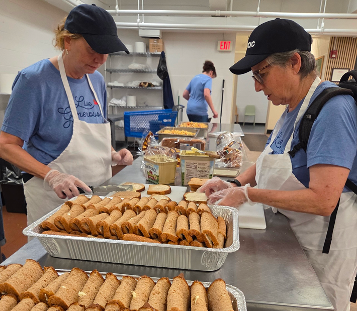 volunteers preparing food